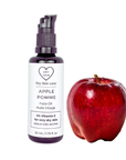 Miron violet glass bottle of apple face oil displayed with a fresh red apple on a white background, Dry Skin Love Apple 5% Vitamin E Face Oil for Very Dry Skin
