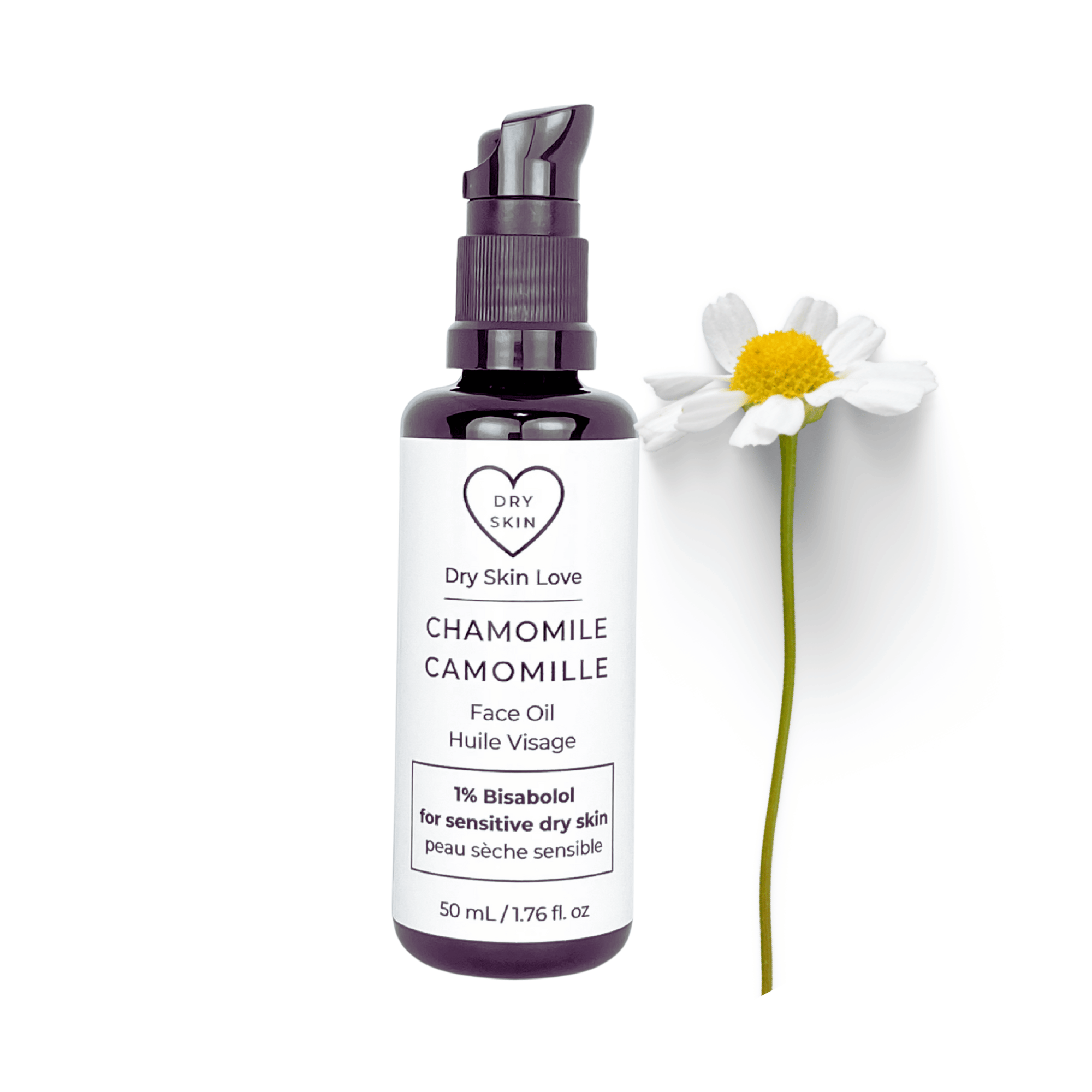Miron violet glass bottle of chamomile face oil displayed with a fresh chamomile flower on a white background, Dry Skin Love Chamomile 1% Bisabolol Face Oil for Sensitive Skin.