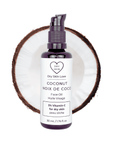Miron violet glass bottle of coconut face oil displayed with a fresh coconut cut in half on a white background, Dry Skin Love Coconut 5% Vitamin C Face Oil for Sensitive Skin.