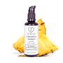 Miron violet glass bottle of pineapple face oil displayed with a fresh pineapple slice on a white background, Dry Skin Love Pineapple 10% Vitamin C Face Oil for Dry Aging Skin.