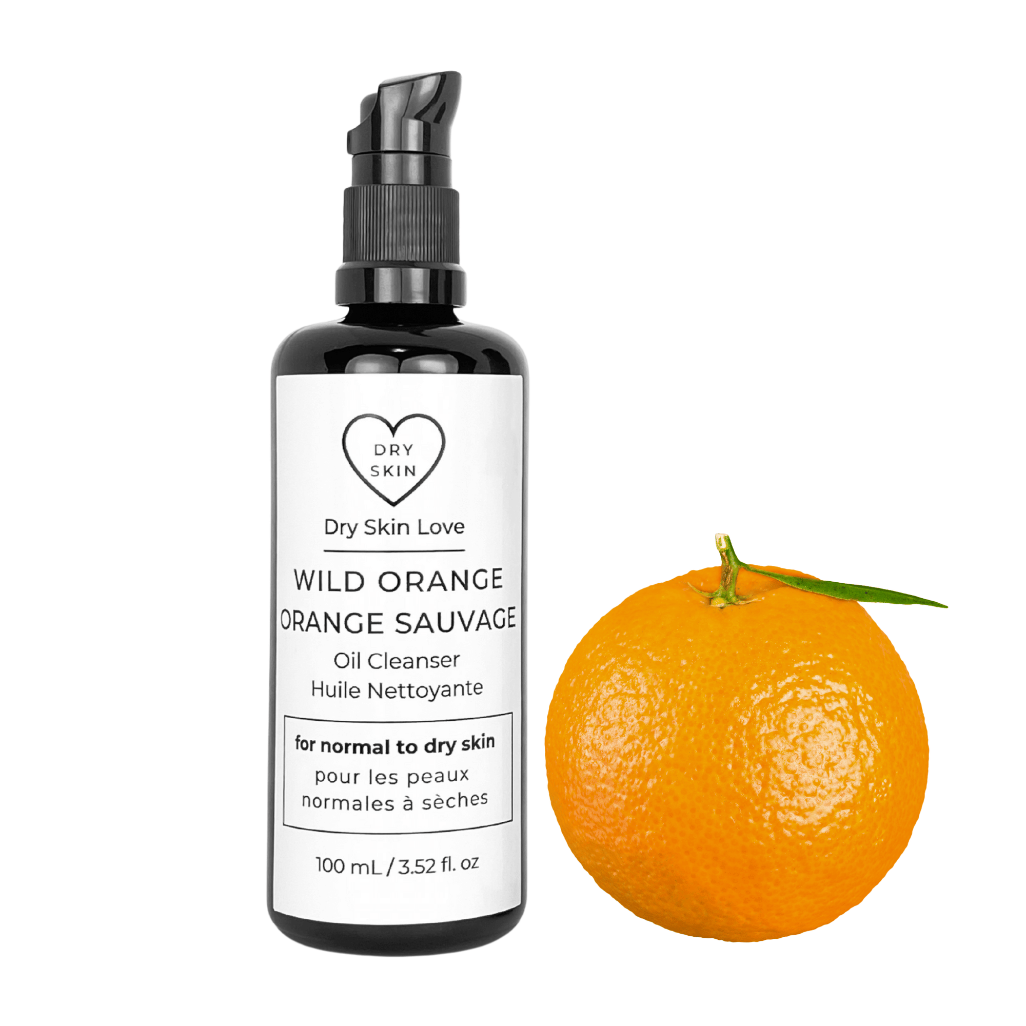Miron violet glass bottle of orange face cleanser displayed with a fresh orange on a white background, Dry Skin Love Wild Orange Oil Cleanser for Dry Skin.